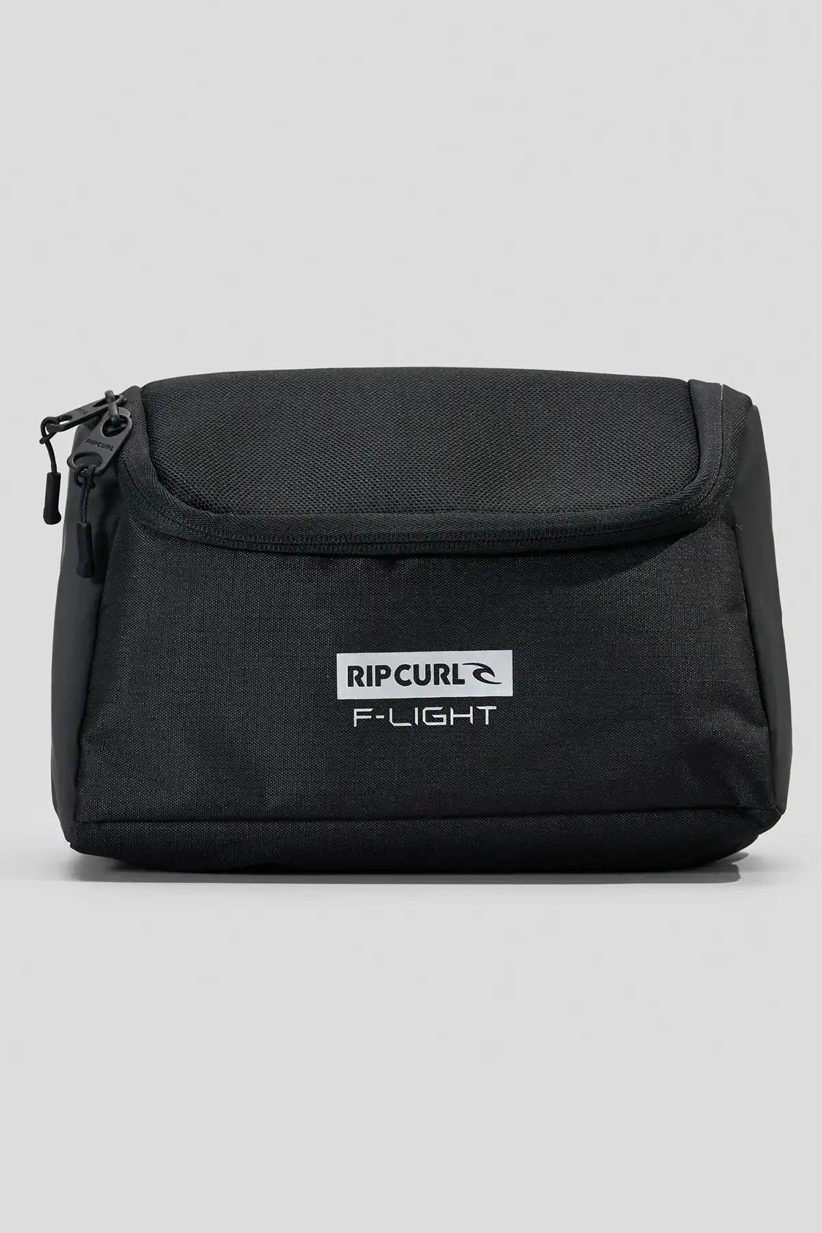 Black Rip Curl toiletry bag on a gray background