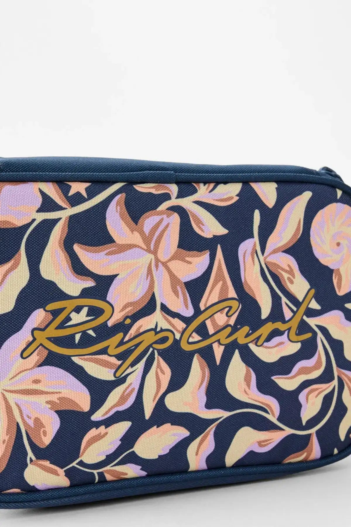 Floral-patterned lunch bag with ' Rip Curl' branding on a white background