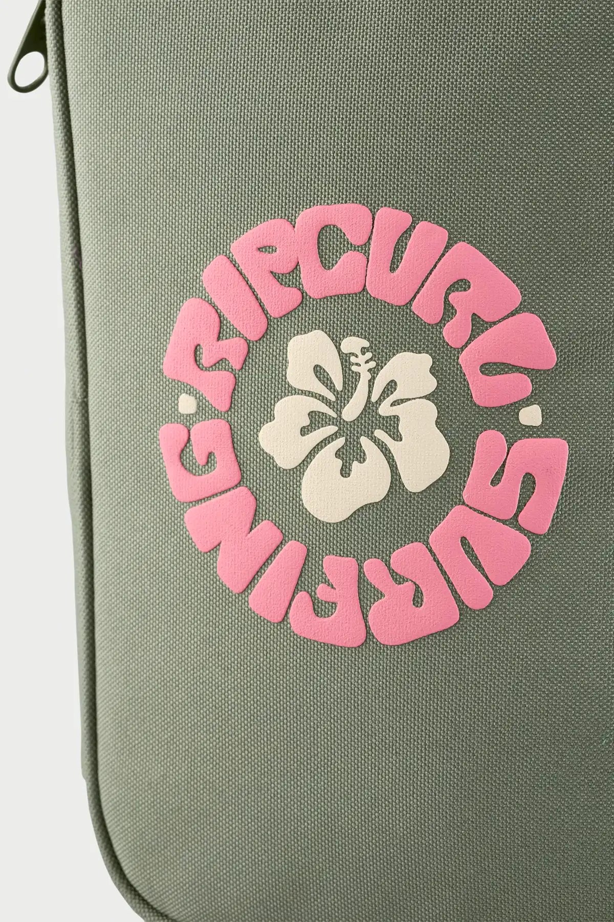 Rip Curl Sea Spray Green lunch box with pink 'Rip Curl Surfing' logo on a white background