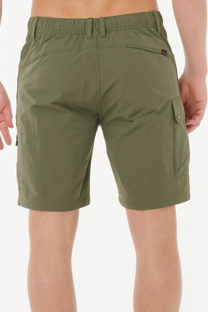  Rip Curl deep cactus green shorts worn by a person on a white background