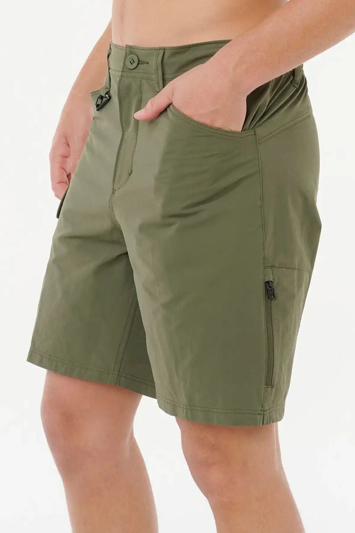 Person wearing Deep Cactus Green Rip Curl  shorts on a white background