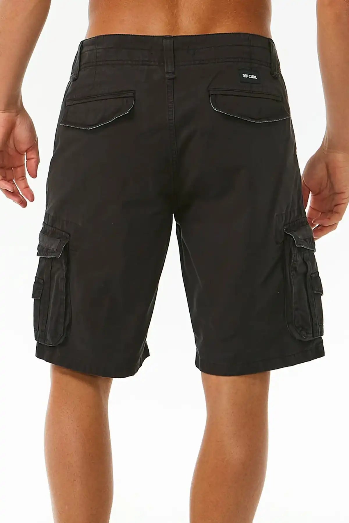 Rip Curl Washed Black  cargo shorts worn by a person on a white background back view