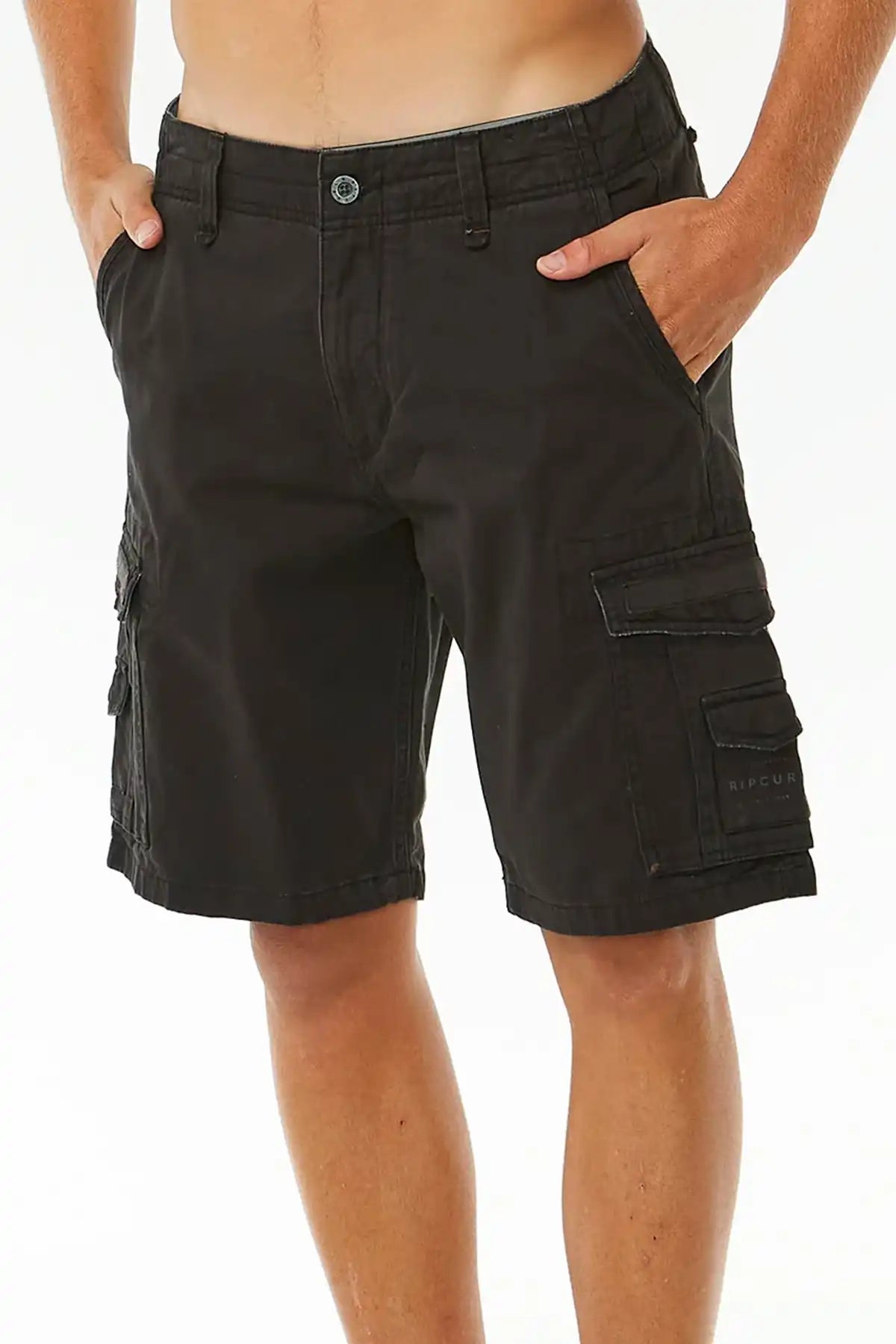 Black cargo shorts worn by a person on a white background