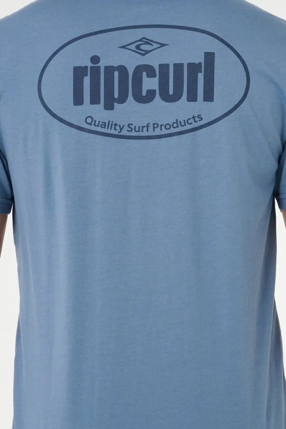 Blue t-shirt with Rip Curl logo on the back against a white background