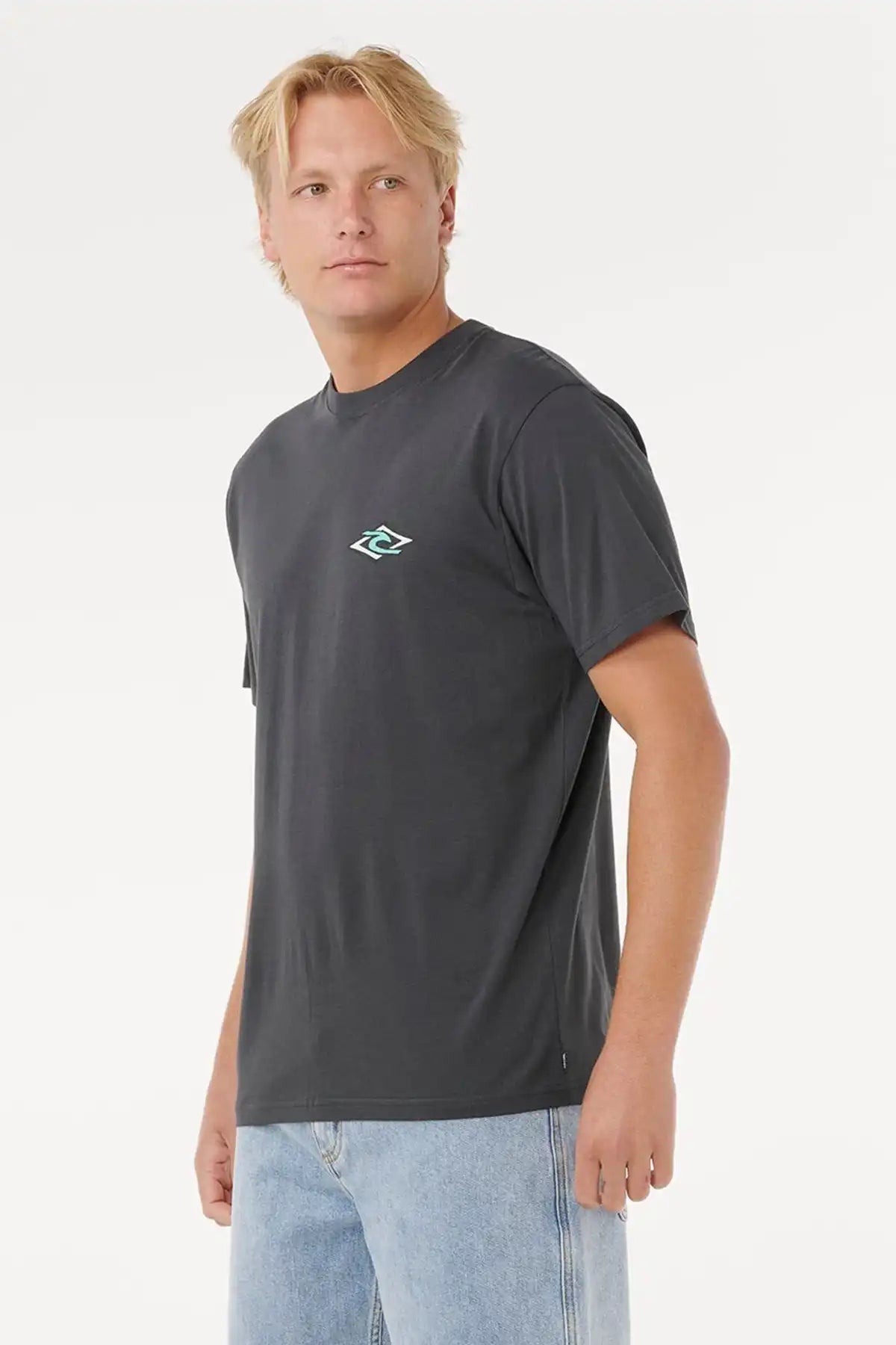 Man wearing a washed black Rip Curl t-shirt with a logo on a white background