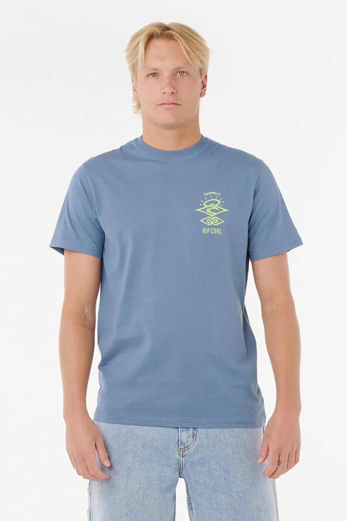 Man wearing a Rip Curl Mens Search Icon Tee in Blue Fin with a logo on a white background front on view