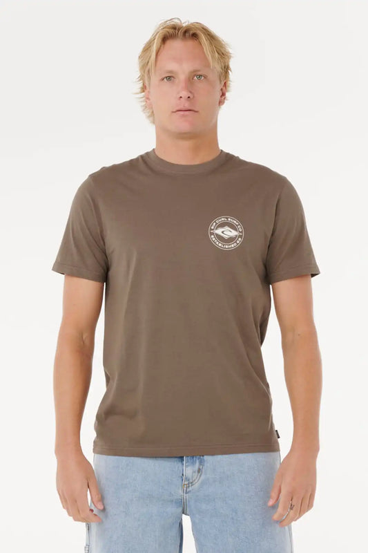Man wearing a brown t-shirt with a logo on a white background