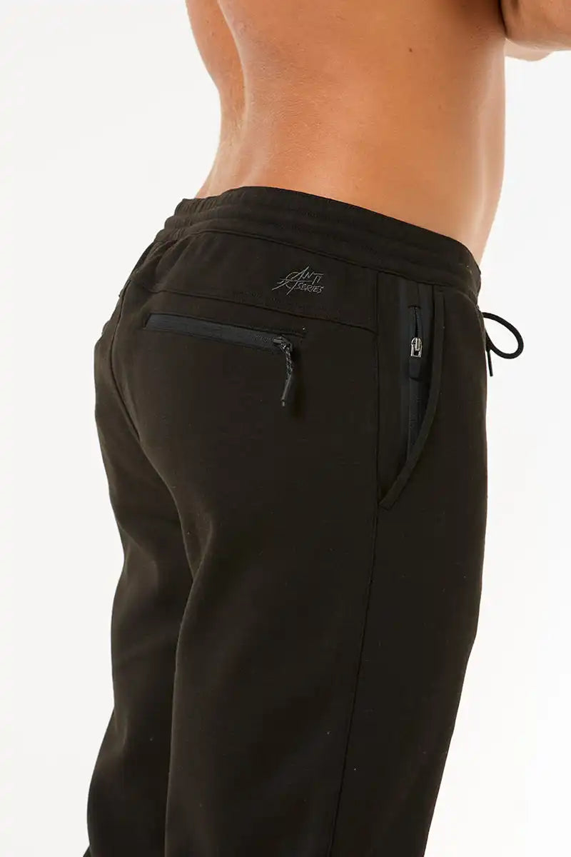 Rip Curl Mens Trackpant Anti Series Departed in Black back and front pocket detail view