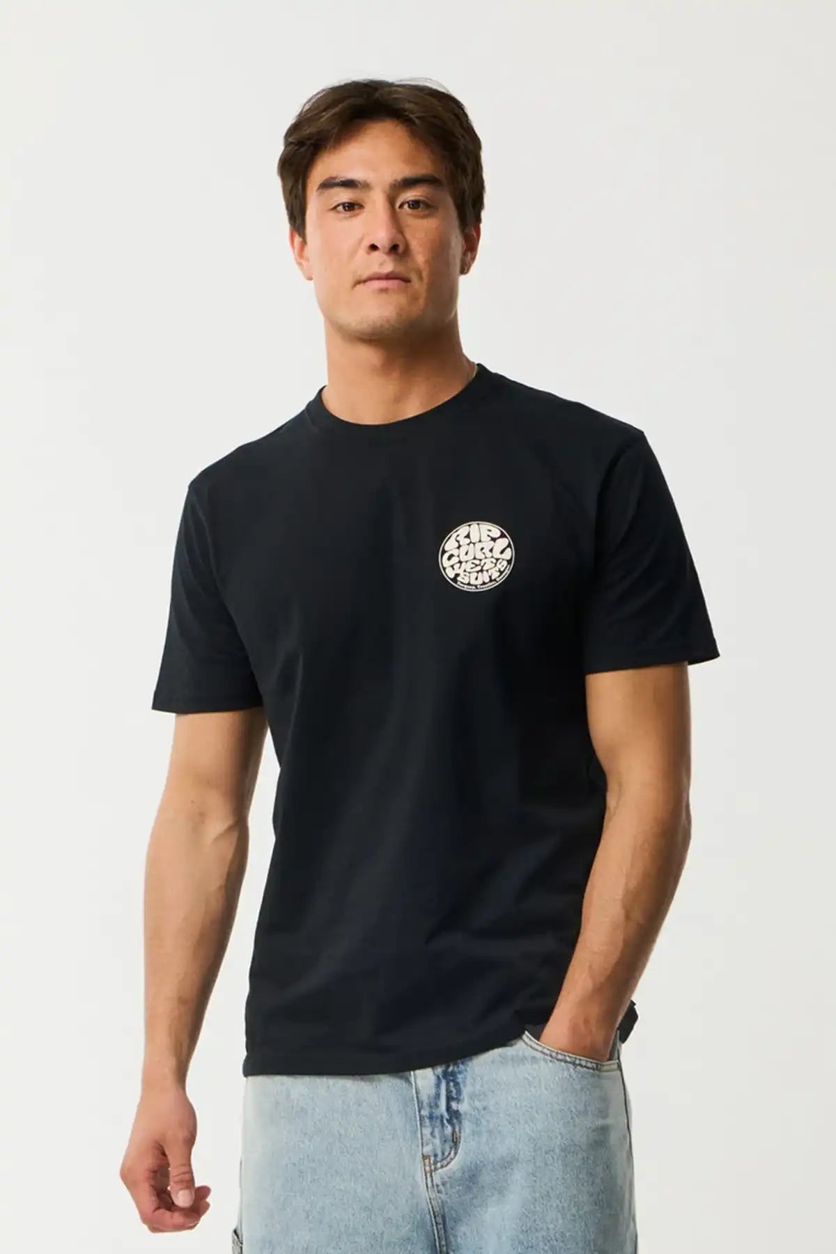 Man wearing a black t-shirt with a white Rip Curl logo on a white background