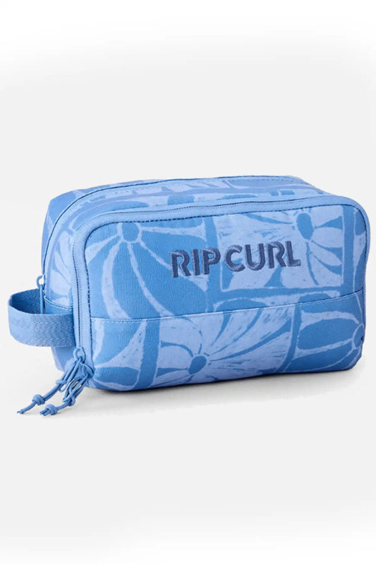 Blue toiletry bag with Rip Curl logo on a white background