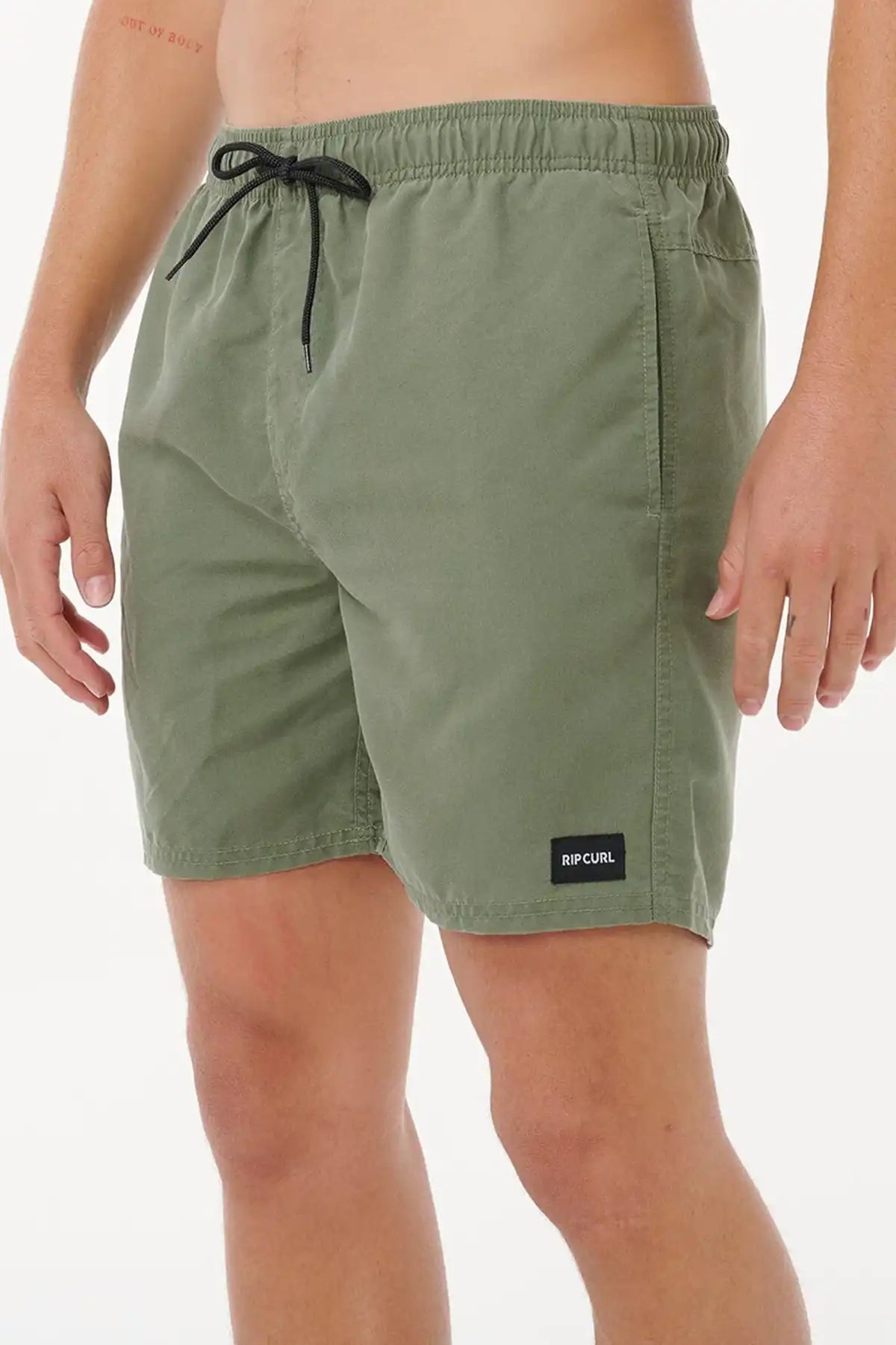 Green shorts with a Rip Curl brand logo on a white background
