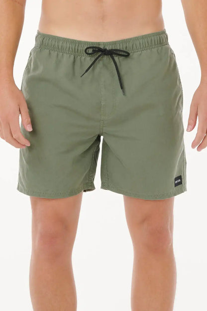 Green Rip Curl shorts with a black drawstring on a white background