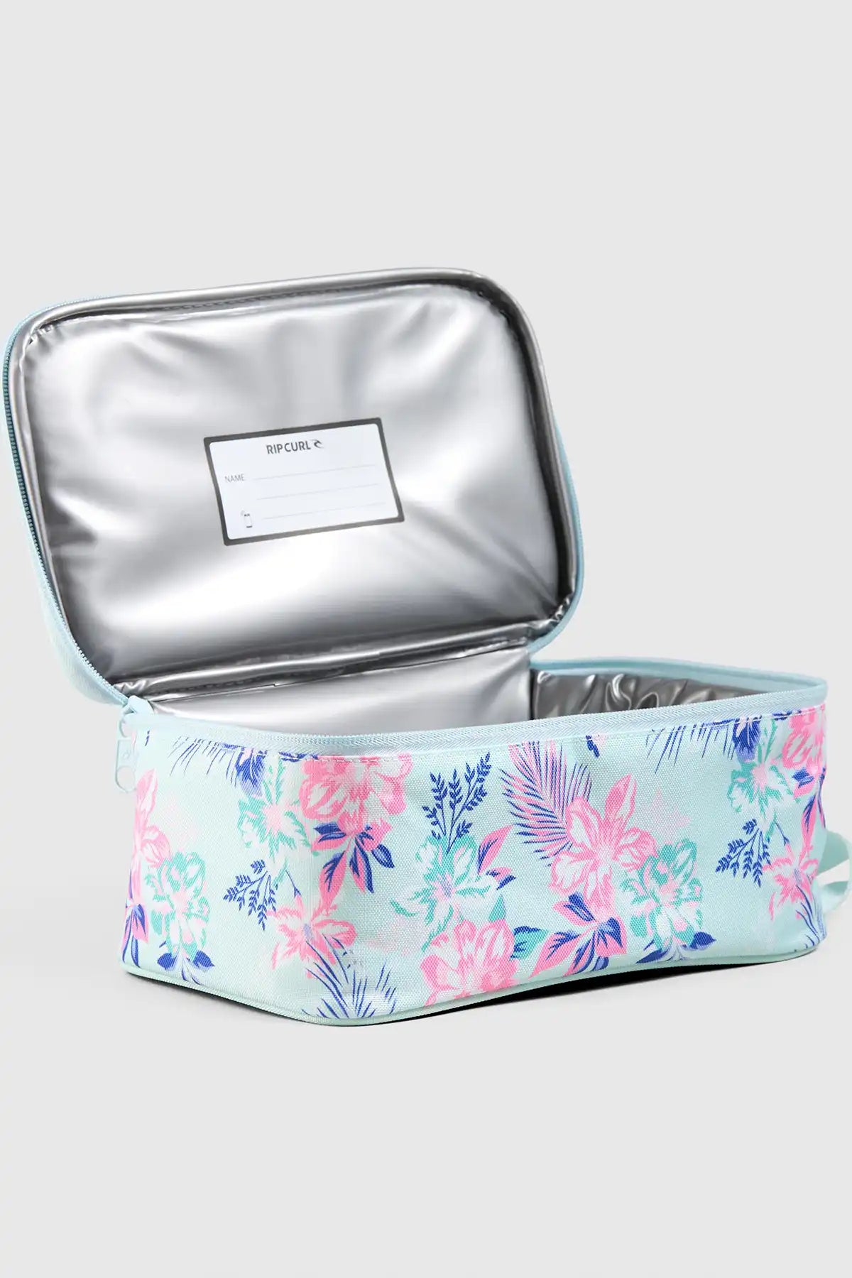 Floral-patterned lunch bag with metallic coloured interior on a white background