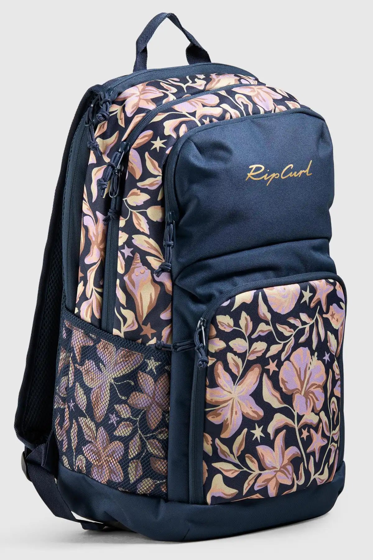 Navy backpack with floral pattern and 'Rip-Curl' branding on a light gray background