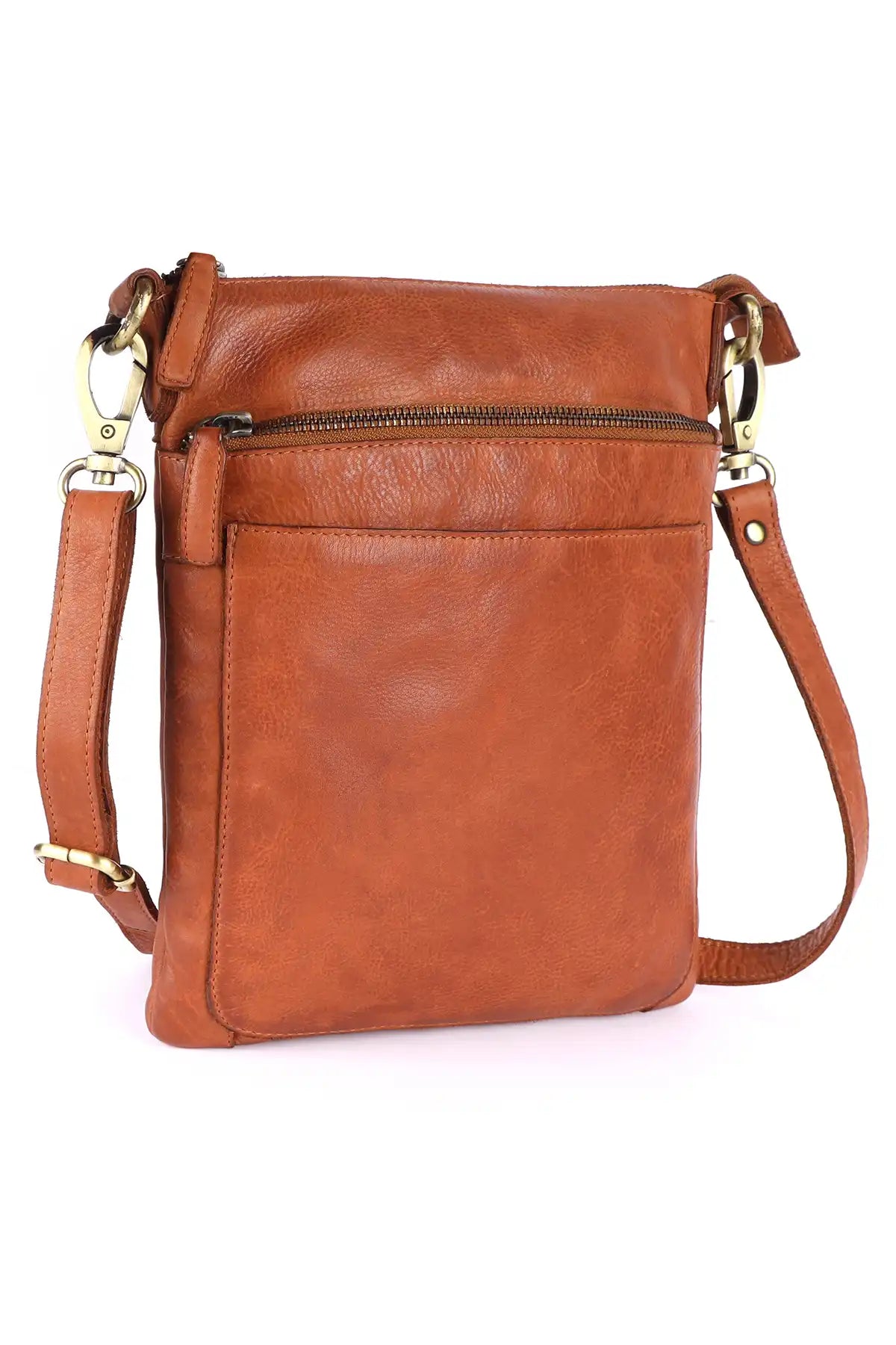 Cognac leather crossbody bag on a white background 3/4 shot