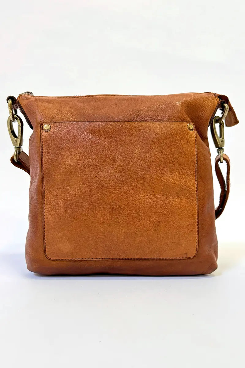 Front view of the Rugged Hide Jackie Cross body bag in Tan showing front external pocket