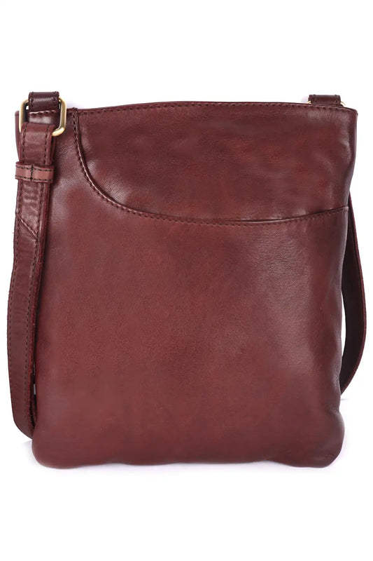 Brown leather Leeds crossbody bag on a white background front