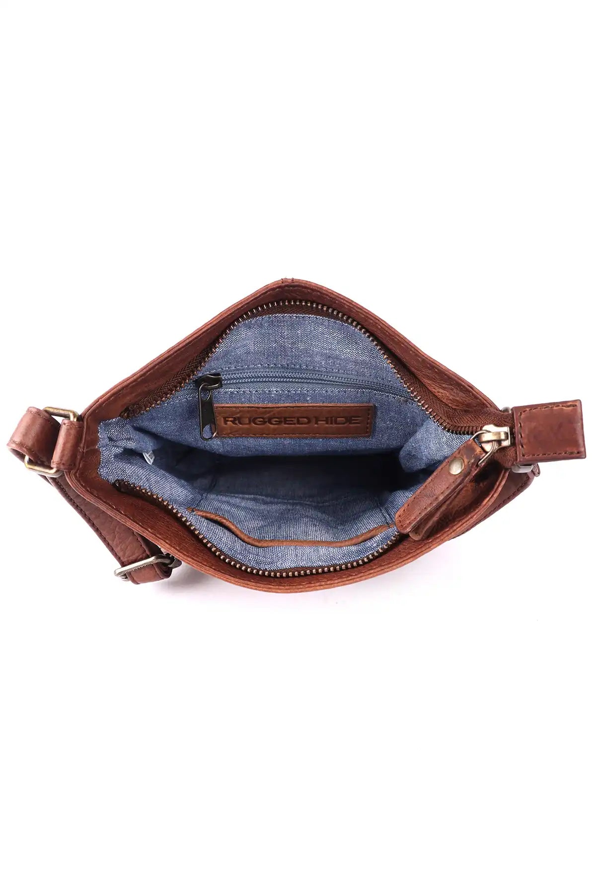 Brown leather crossbody bag with denim interior on a white background