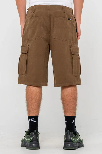 Rusty Commando 23" Baggy Cargo Short in Pinecone, back view worn by a person on a white background