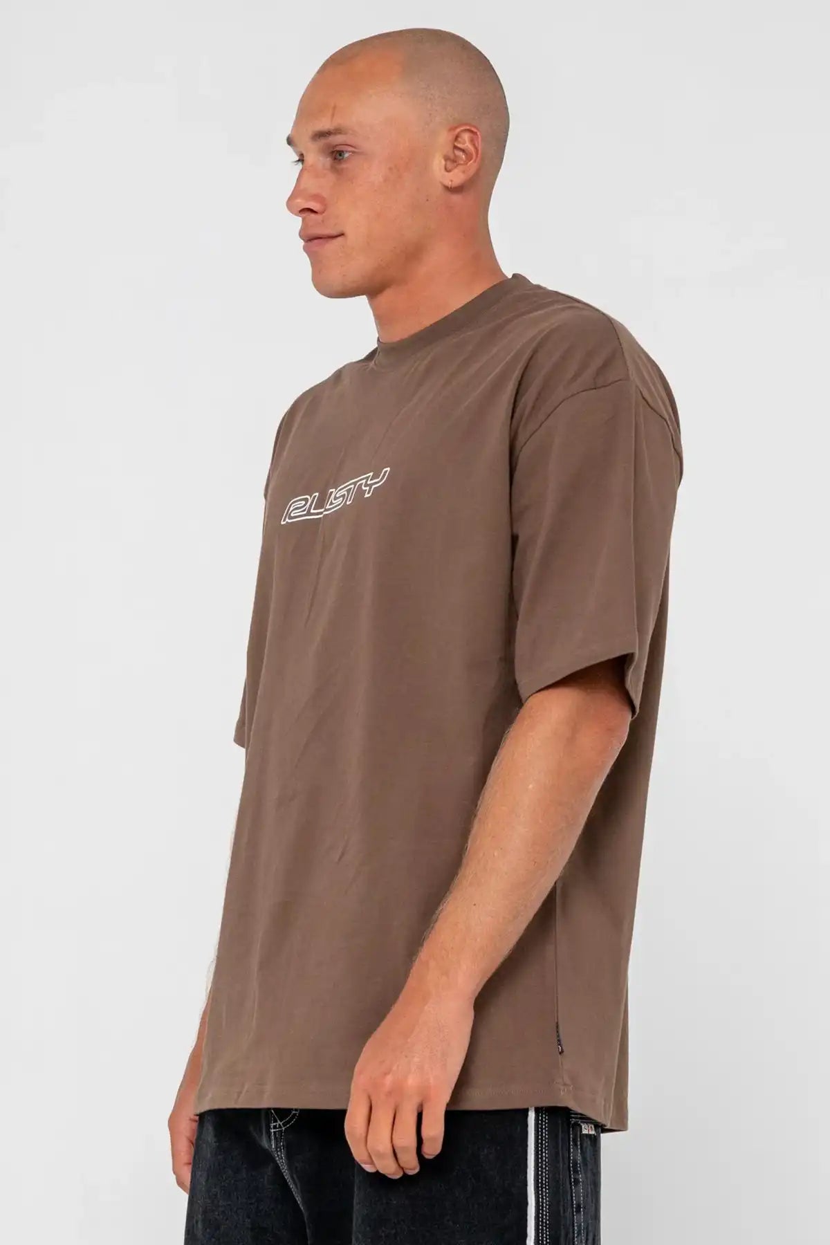 Man wearing a brown t-shirt with a logo on a white background
