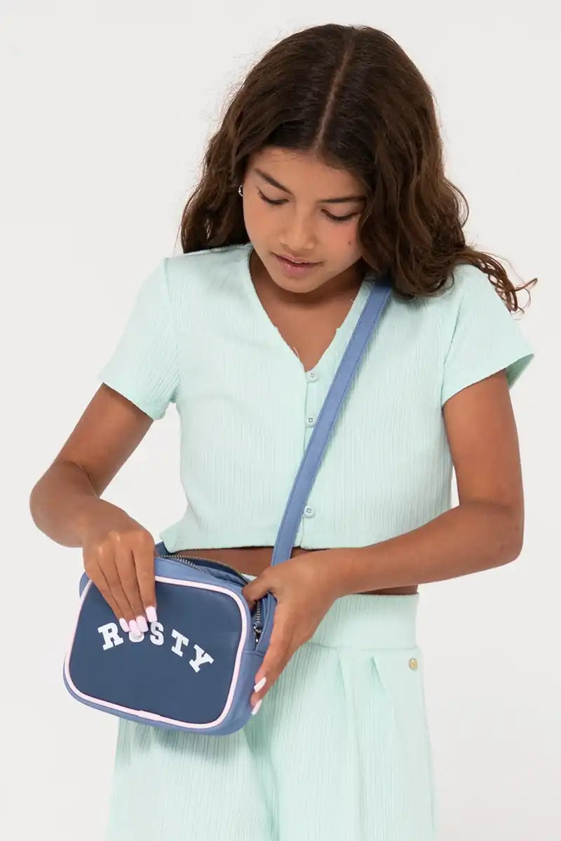 Rusty Girls Sweet Water Crossbody Bag in Yonder Blue detail view of girl wearing the bag