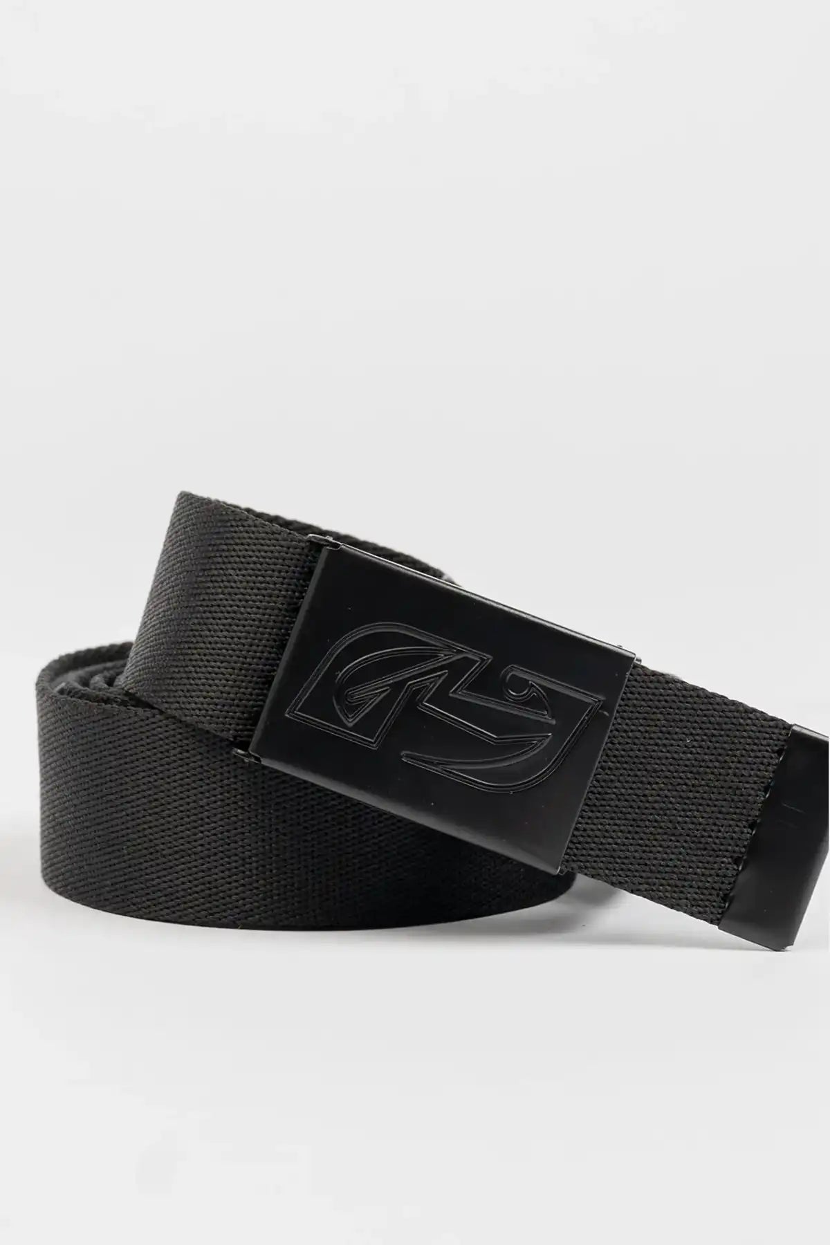 Rusty Jagged Webbing Belt — Black coiled up on white background