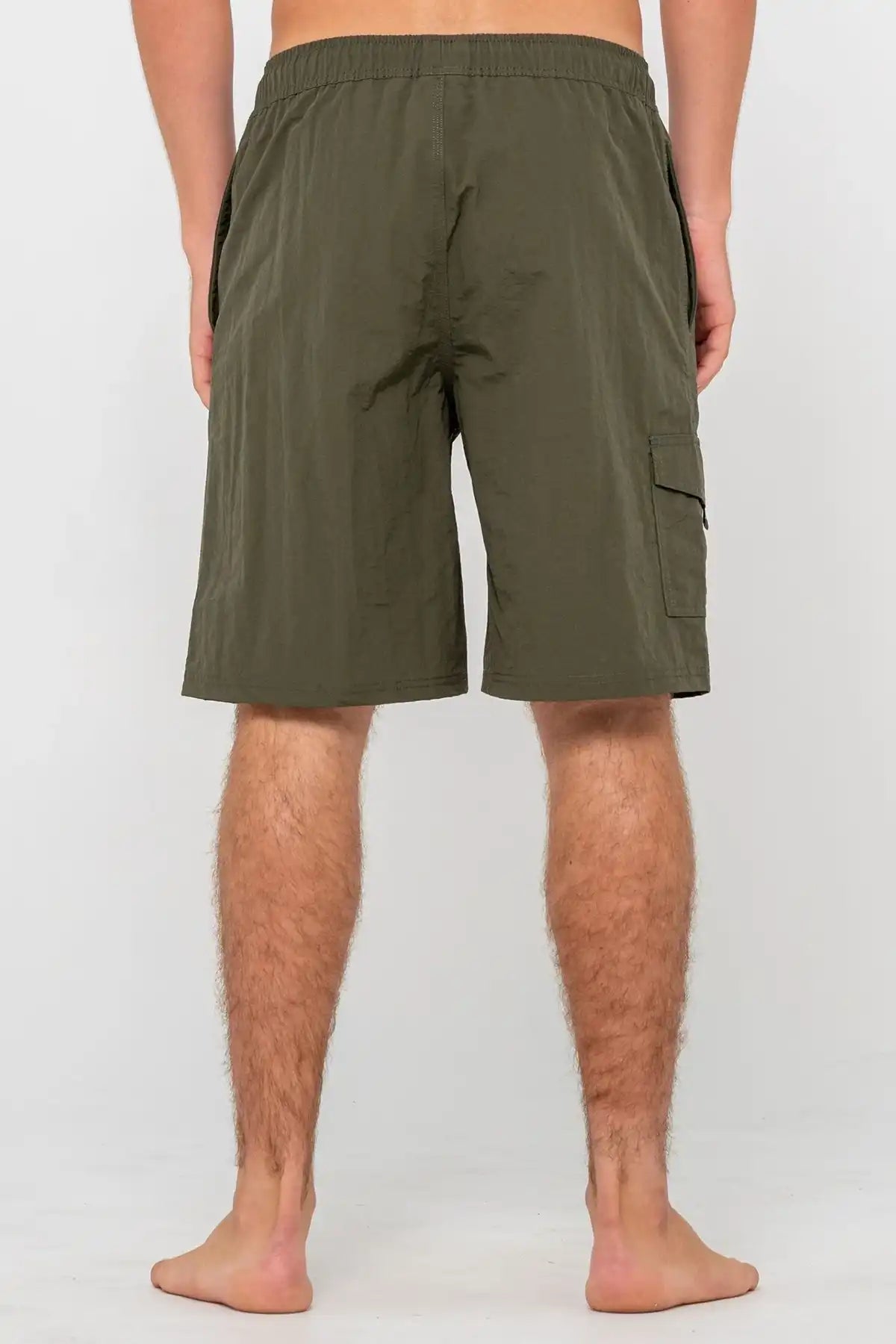 man wearing Rusty Mens BoardShort Peek Show Hybrid Waist in Army Green on white background back view