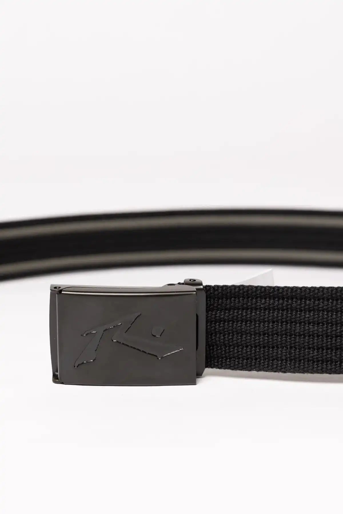 Rusty Ridgemont Reversible Webbing Belt — Black on white background showing buckle