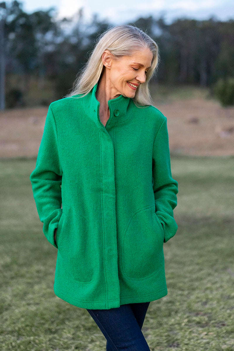 See Saw Boiled Wool Funnel Neck Coat in Emerald front view showing pockets