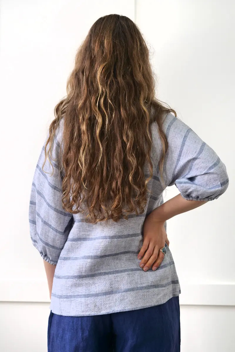 back view See Saw Linen 3/4 Sleeve V Neck Top