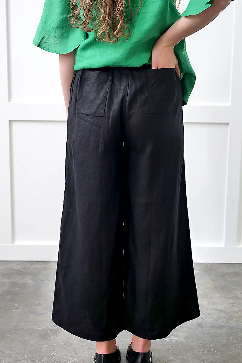 back view of the See Saw Linen Palazzo Pant in Black