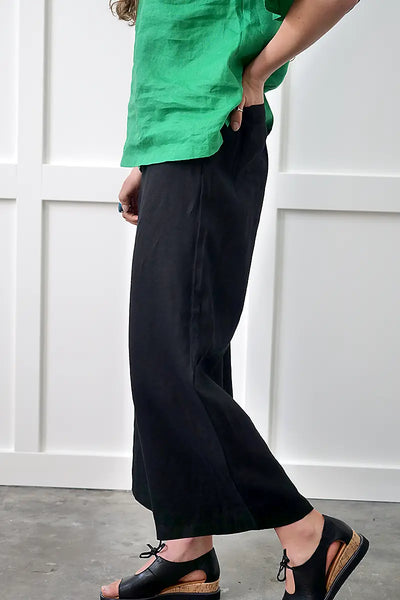 side view of the See Saw Linen Palazzo Pant in Black