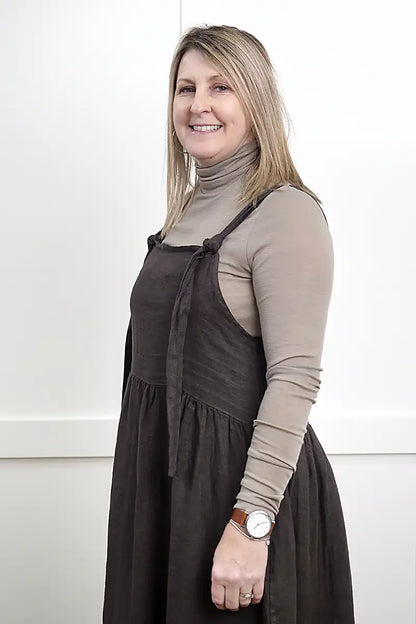 Sofia Linen Pinafore Dress – Dark Chocolate side view with chille merino wisper top in latte