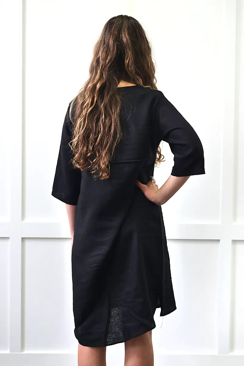 back view of the See Saw Linen 3/4 Seam Detail 1 Pkt dress in Black