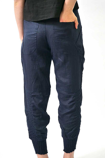 back view of the Foil The Works Pant in True Navy