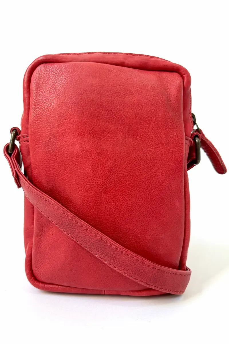 view of the back of Rugged Hide Leather Bag - Small Sling Hailey Red with shoulder strap
