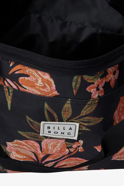detailed view of the logo and front pocket on the Billabong Women's Weekender Duffle Bag in Black Pebble