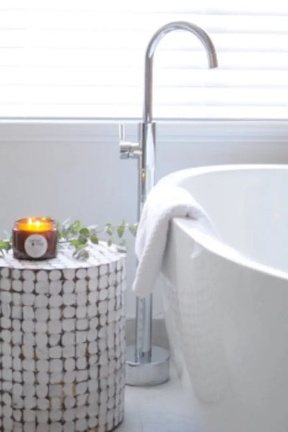 Mabel + Meg Soy Candle in Boho in XL next to the bath