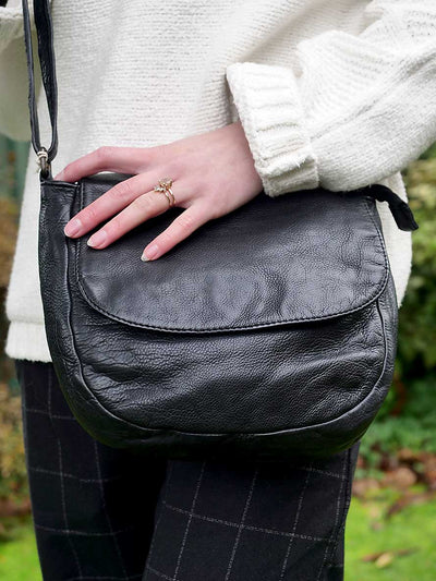 close up view of the Rugged Hide Bag - Jessica Cross Body Black