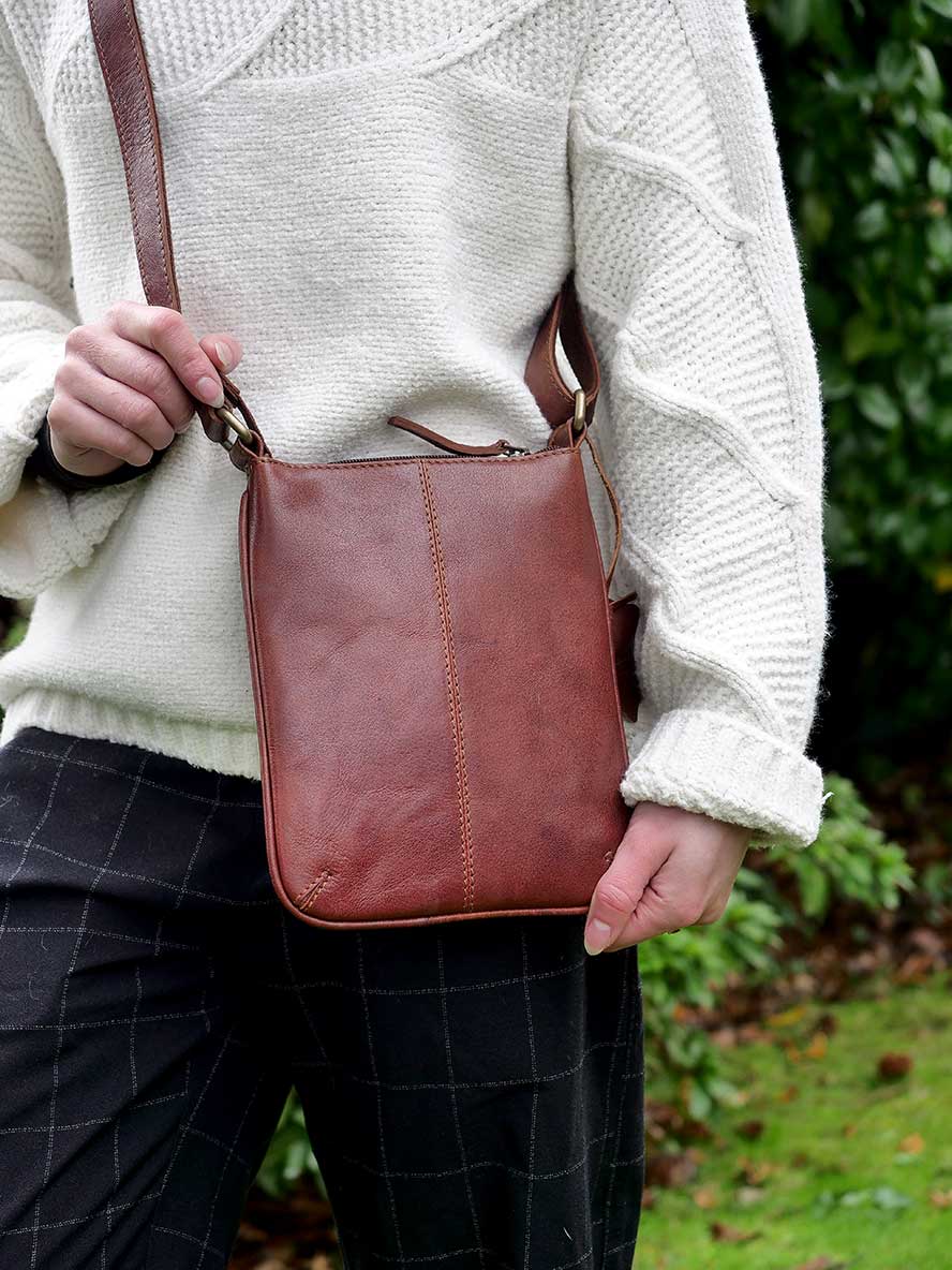 front of the Oran Leather Cross Over Bag - Kimberly in Brandy