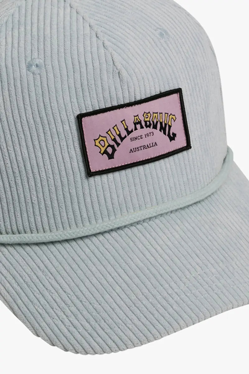 detailed view of the logo patch on the Billabong Since 73 Cap in Dusk Blue