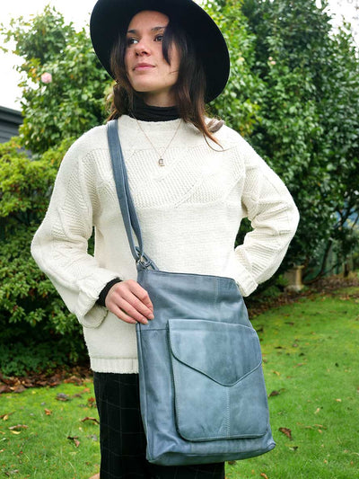 model wearing the Rugged Hide Ladies Leather Bag - Emily Midnight Blue