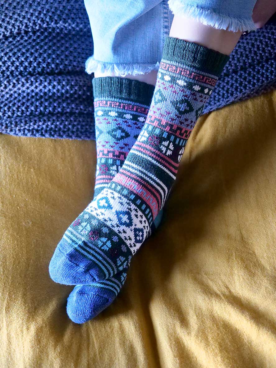 Nordic Style Socks in Green on bed