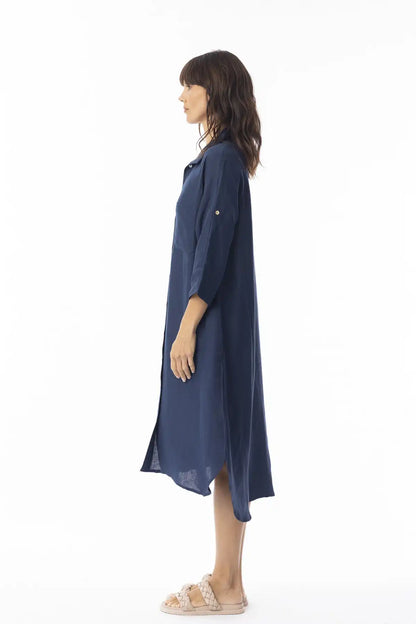 Woman wearing a Orientique Linen Solid Navy Shirt Dress on a white background