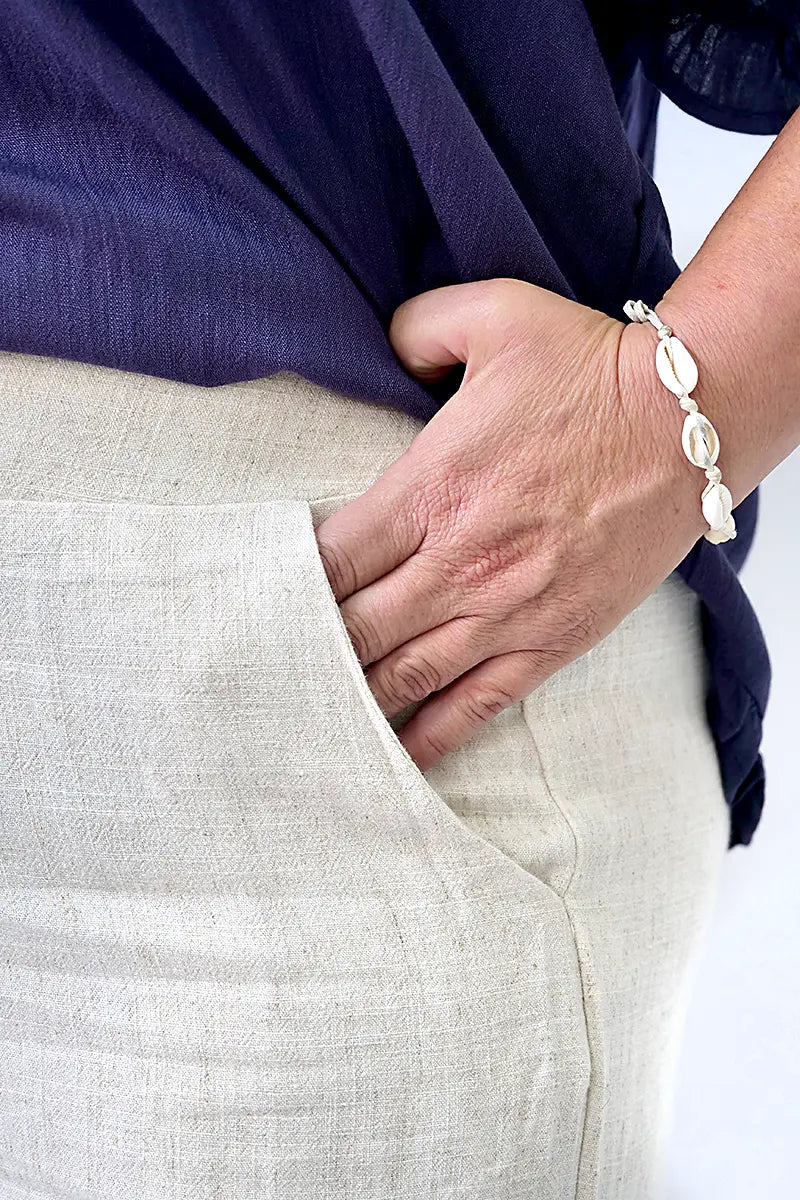 Detailed view of the pocket and waist band on the Belinda Wide Leg Linen Blend Pant in Natural