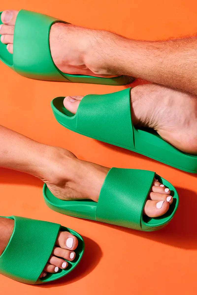 people wearing Archies Arch Support Slides in Kelly Green Limited Edition