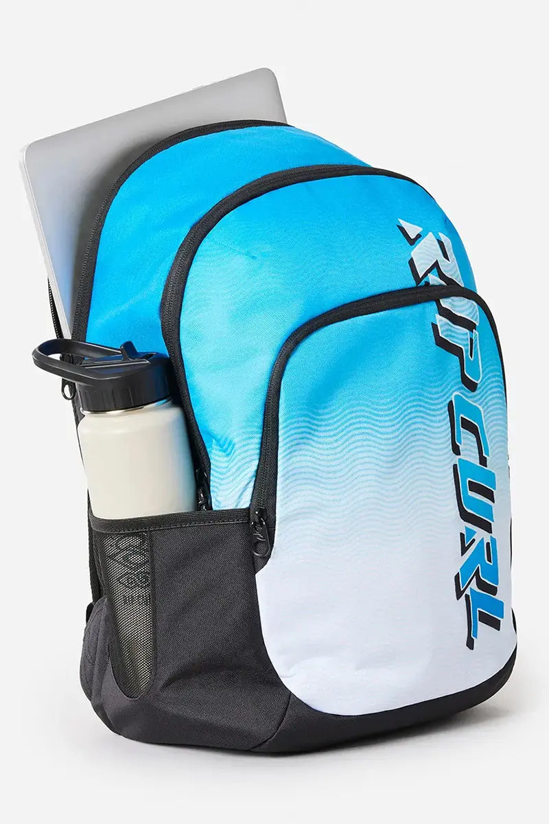 showing laptop pocket and drink bottle compartment on the Rip Curl Back Ozone Faded Slant 30 litre