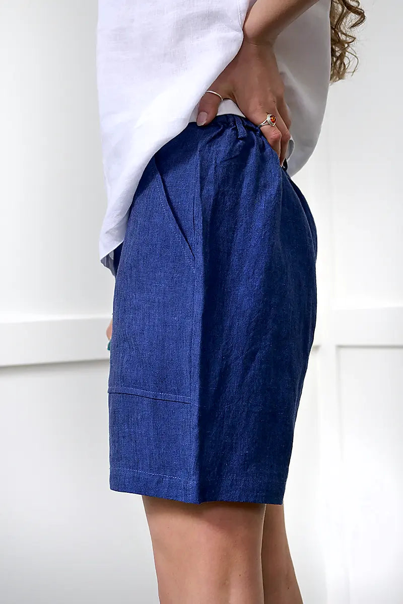 side view of the See Saw Linen Midi Short in Navy