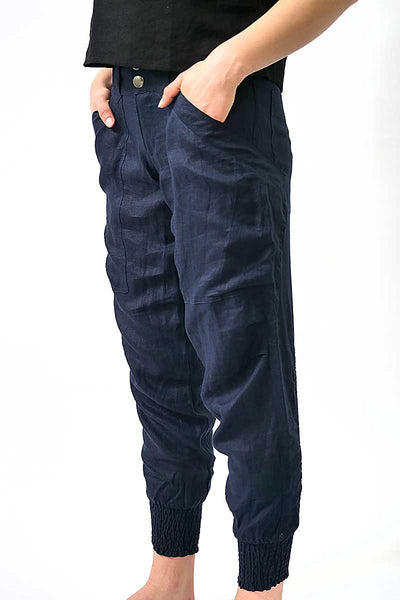 side view of the Foil The Works Pant in True Navy