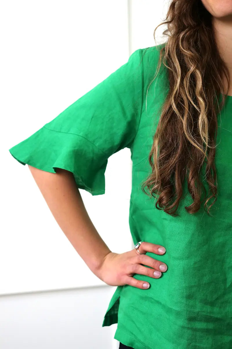 sleeve detail on the See Saw Linen Flutter Sleeve Top in Emerald